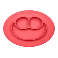 napperon bol assiette de silicone rose ou corail en bonhomme sourire pour alimentation d'enfant ou bébé